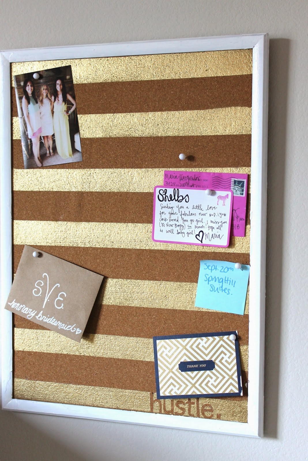 Gold-Painted Strips on Cork Board